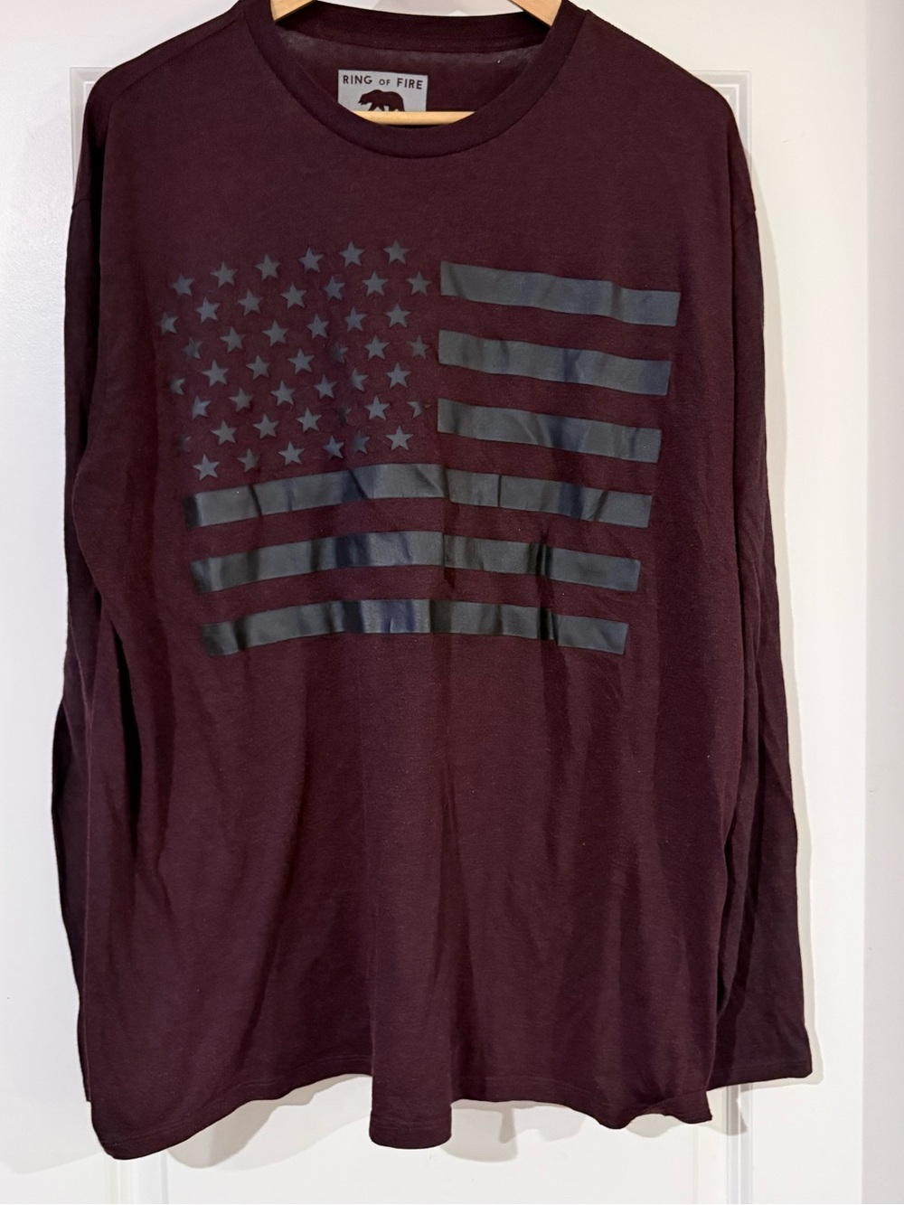 Ring of Fire Men's Long Sleeve Tee in Maroon with Matte Black Flag Graphic